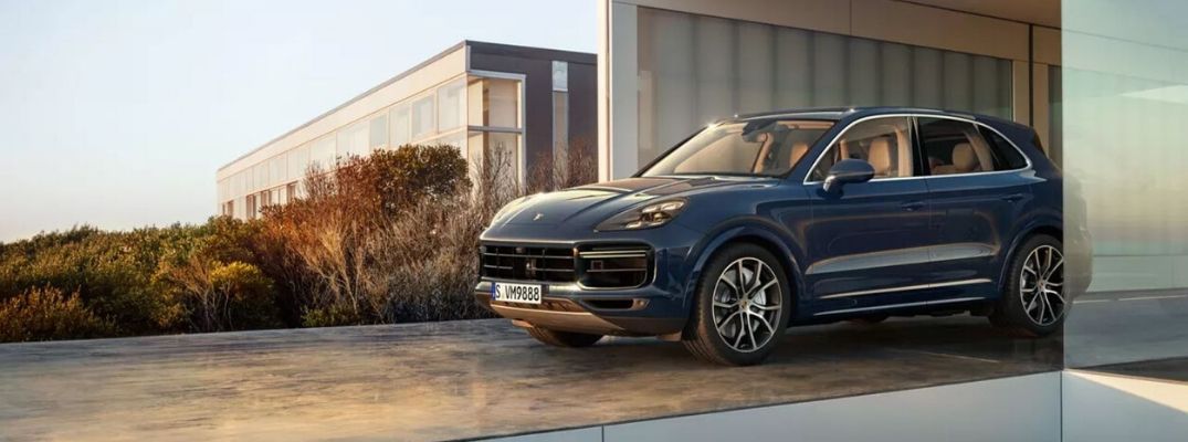 Exterior view of a blue 2020 Porsche Cayenne