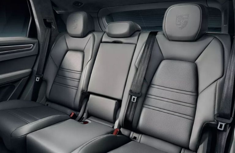 Interior view of the rear seating area inside a 2020 Porsche Cayenne