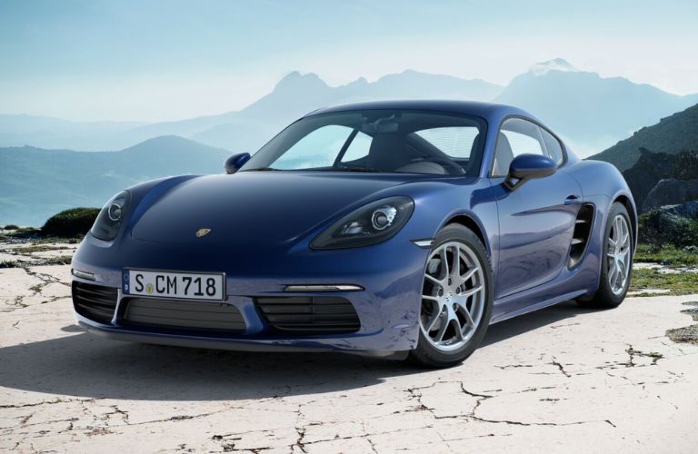 Front-quarter view of the 2025 Porsche 718 Cayman Blue